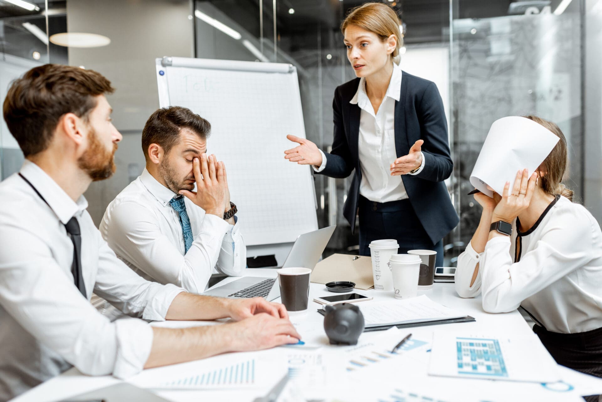 A team debating over the definition of what a KPI or performance measure is. CREDIT: https://www.istockphoto.com/portfolio/RossHelen